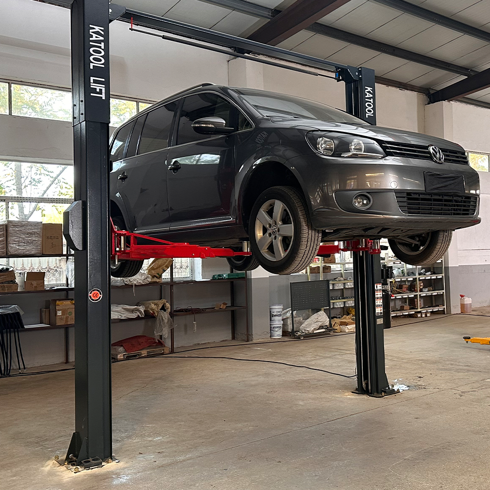 KT-AS110D Two Post asymmetrical arm Vehicle Lift 11,000lbs Single Point Lock Release