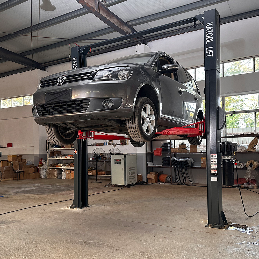 KT-AS110D Two Post asymmetrical arm Vehicle Lift 11,000lbs Single Point Lock Release